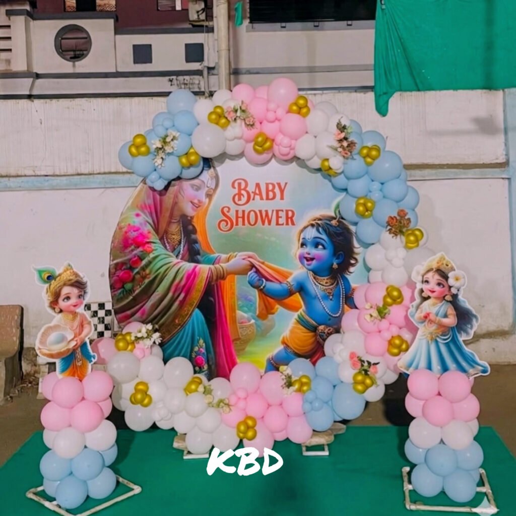 Little Krishna theme baby shower decoration in Kolkata Bal Krishna theme balloon decor with peacock feathers by KBD Laddu Gopal theme baby shower stage decoration Howrah Janmashtami style baby shower decoration for mom-to-be Traditional Krishna theme Godh Bharai decoration Kolkata Blue and yellow Krishna theme balloon backdrop in Howrah Baby shower decoration with Krishna matki and flute props Makhan Chor theme baby shower balloon decoration by KBD Premium Bal Krishna theme floral and balloon decor Kolkata Creative Little Krishna backdrop for baby shower ceremony